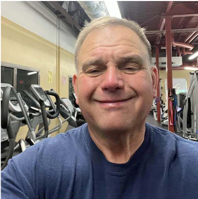 User generated content photo of smiling man in a workout facility