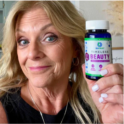 User generated content photo of smiling woman holding a bottle of BioTRUST Timeless Beauty capsules