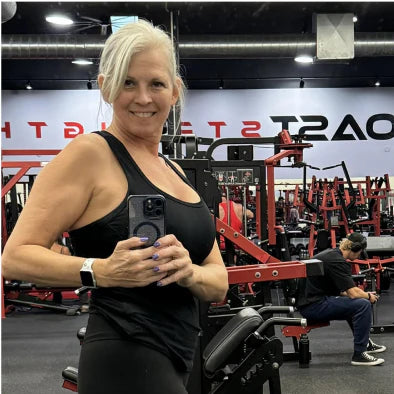 User generated content photo of a lady in a workout center taking a picture of herself in the mirror